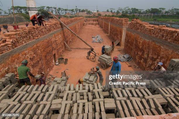 These workers are carrying out back-breaking and exhausting labour in the most risky conditions even under the heat of the sun. They work long hours...