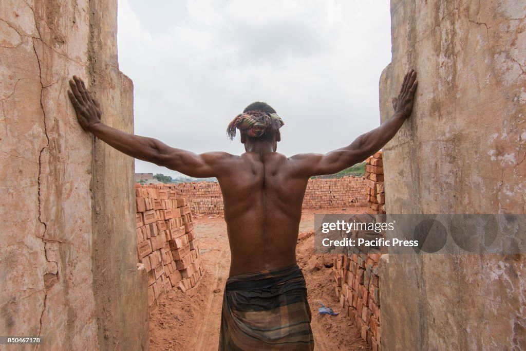 Back Breaking These workers are carrying out back-breaking and exhausting labour in ...
