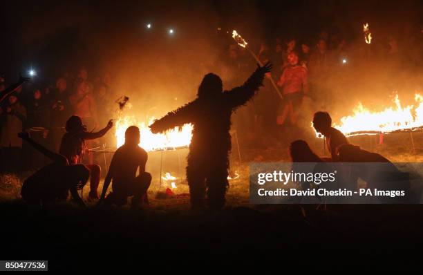 Performance groups on Calton Hill, Edinburgh during the Beltane Fire Festival.