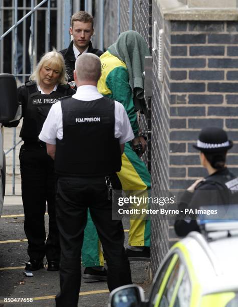 Mark Bridger arrives at Mold Crown Court, charged with abducting and murdering April Jones, and of unlawfully disposing of and concealing her body...