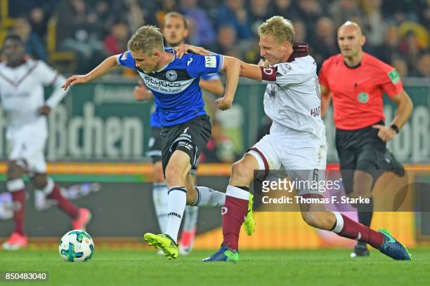 Marco Hartmann of Dresden tackles Patrick Weihrauch of Bielefeld during the Second Bundesliga match between SG Dynamo Dresden and DSC Arminia...