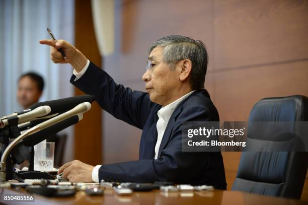 Haruhiko Kuroda, governor of the Bank of Japan , gestures as he takes questions during a news conference in Tokyo, Japan, on Thursday, Sept. 21,...