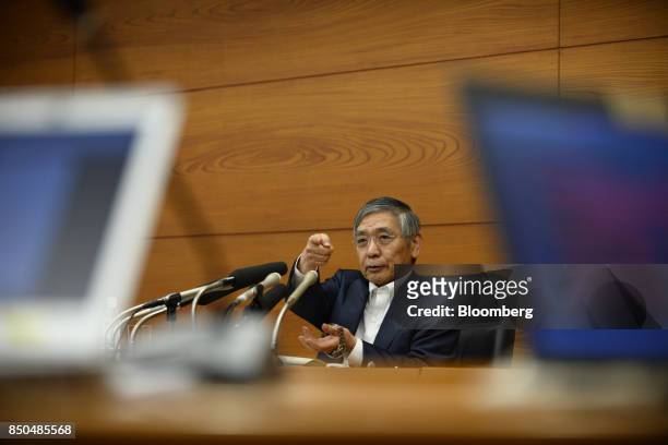 Haruhiko Kuroda, governor of the Bank of Japan , gestures as he takes questions during a news conference in Tokyo, Japan, on Thursday, Sept. 21,...