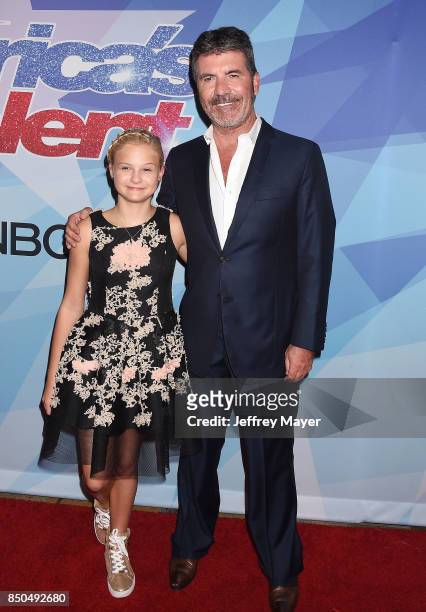Producer-entrepreneur-philanthropist Simon Cowell and ventriloquist-singer Darci Lynne Farmer attend NBC's 'America's Got Talent' Season 12 Finale at...