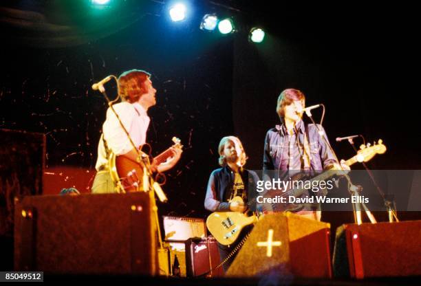 Photo of Nick LOWE and BRINSLEY SCHWARZ and Ian GOMM, L-R: Brinsley Schwarz, Ian Gomm, Nick Lowe - performing live onstage, supporting Wings