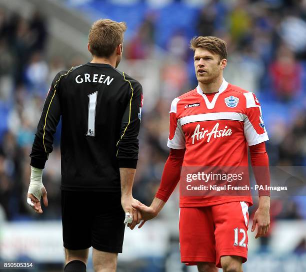 Queens Park Rangers goalkeeper Rob Green shakes hands with team-mate Jamie Mackie after the final whistle