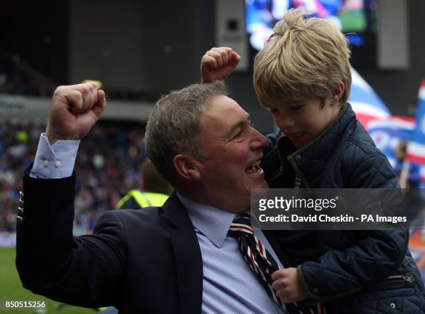 Rangers manager Ally McCoist celebrates with his son Arran after winning the league cup after the IRN-BRU Scottish Third Division match at Ibrox...