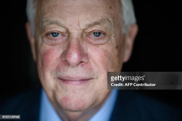 Hong Kong's former British colonial governor Chris Patten poses during an interview with AFP at the harbourside Mandarin Oriental hotel in Hong Kong...