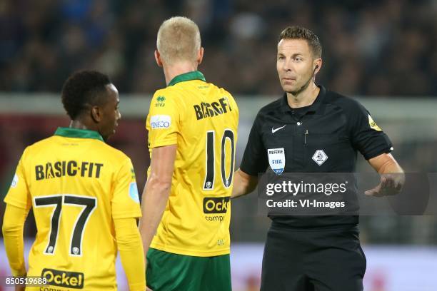 Elson Hooi of ADO Den Haag, Lex Immers of ADO Den Haag, referee Pol van Boekel during the First round Dutch Cup match between Feyenoord Rotterdam and...