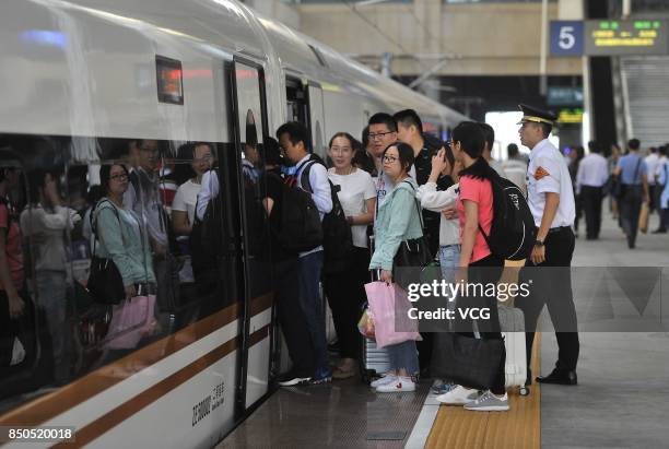 Fuxing' bullet train arrives at Jinan West Railway Station on September 21, 2017 in Jinan, Shandong Province of China. China's 'Fuxing' bullet trains...