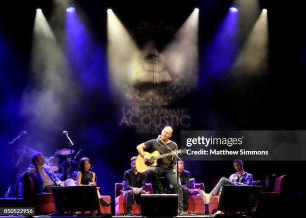 Singer Gian Marco performs onstage with Latin Recording Academy President and CEO Gabriel Abaroa, Becky G, Pablo Hurtado, Mario Domm and Melendi at...