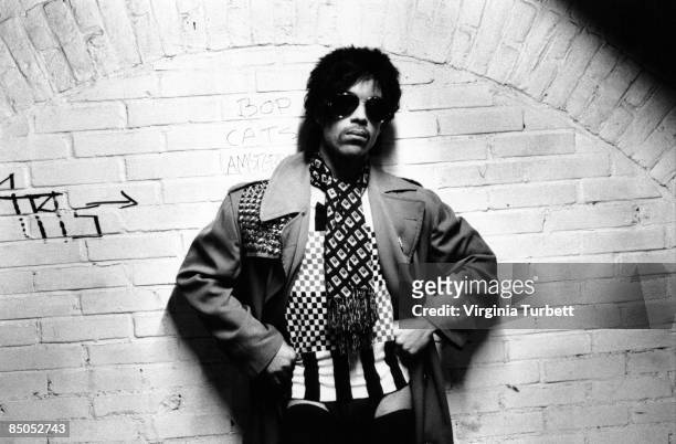 American singer songwriter Prince poses wearing round sunglasses, Netherlands, 29th May 1981.