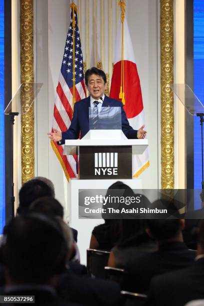 Japanese Prime Minister Shinzo Abe addresses at the New York Stock Exchange on September 20, 2017 in New York City. Abe is on 5-day tour to the...