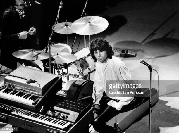 American singer-songwriter Jim Morrison of The Doors, at the Gladsaxe Television-Byen TV studio in Copenhagen, Denmark, September 1968. Drummer John...