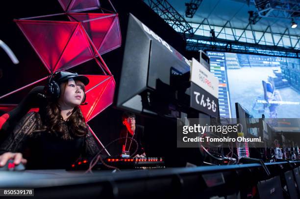 Attendees play the Player Uunknown's Battlegrounds video game during an e-Sports event held as part of the Tokyo Game Show 2017 at Makuhari Messe on...