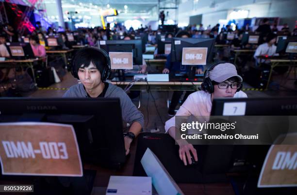 Attendees play the Player Uunknown's Battlegrounds video game during an e-Sports event held as part of the Tokyo Game Show 2017 at Makuhari Messe on...