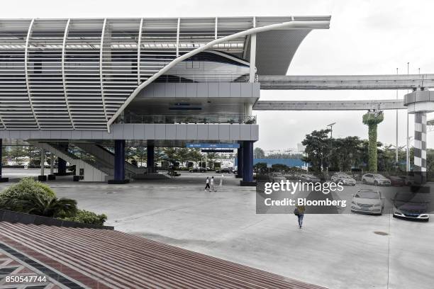 Co. SkyRail monorail train stands at a station at the company's headquarters in Shenzhen, China, on Thursday, Sept. 21, 2017. China will likely order...
