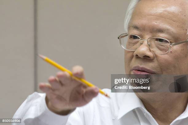 Perng Fai-nan, governor of the Central Bank of the Republic of China , gestures as he speaks during a news conference in Taipei, Taiwan, on Thursday,...