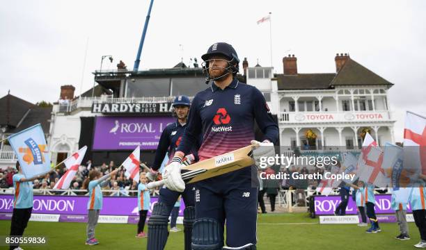 Jonathan Bairstow and Alex Hales of England walk out to bat during the 2nd Royal London One Day International match between England and the West...