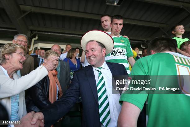 Yeovil Town manager Gary Johnson celebrates with fans and his players after the final whistle