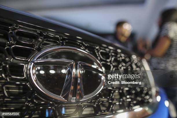 Logo sits on the front of Tata Motors Ltd.'s new Nexon sports utility vehicle during a launch event in Mumbai, India, on Thursday, Sept. 21, 2017....