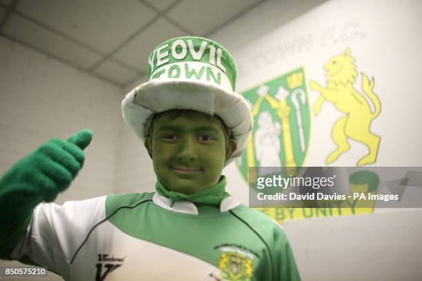 The Yeovil Town match day mascot poses in Hush Park before the game