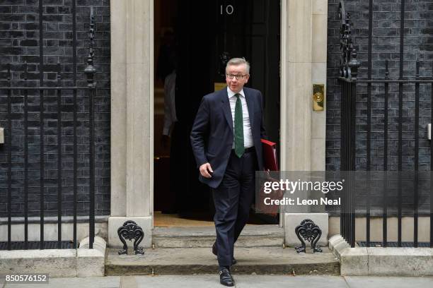 Britain's Environment Secretary Michael Gove leaves number 10, Downing Street following an extended Cabinet meeting on September 21, 2017 in London,...