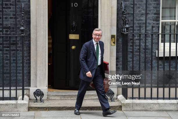 Britain's Environment Secretary Michael Gove leaves number 10, Downing Street following an extended Cabinet meeting on September 21, 2017 in London,...