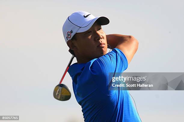 Anthony Kim hits a shot during a practice round prior to the start of the Accenture Match Play Championship at the Ritz-Carlton Golf Club at Dove...