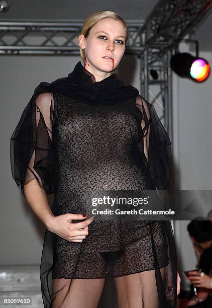 Model walks down the catwalk during the House of Blue Eyes show as part of London Fashion Week a/w 2009 at Beach Blanket Babylon on February 24, 2009...