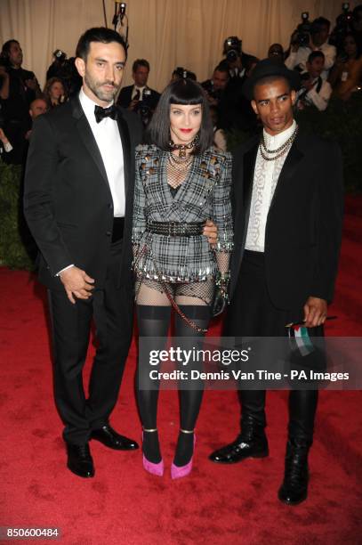 Brahim Zaibat, Madonna and designer Riccardo Tisci attend the 'Punk': Chaos to Couture' Costume Institute Benefit Met Gala at the Metropolitan Museum...