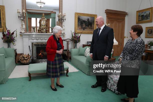 General Sir Peter Cosgrove, the Governor-General of Australia with Lady Cosgrove as they meet Queen Elizabeth II during a private audience in the...