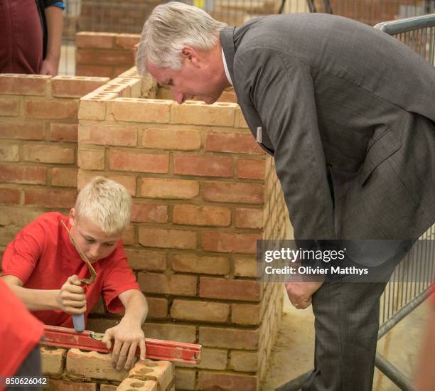 King Philippe of Belgium and Queen Mathilde of Belgium visit the Asty-Mouli school for wood and construction skills, in the Province of Namur on...