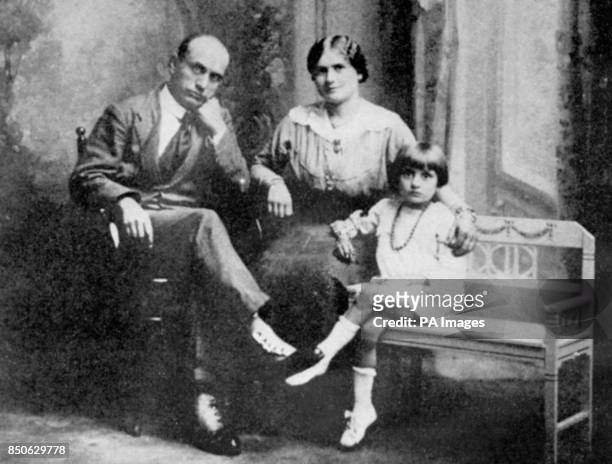 Member of the 'Fasci d'Azione Rivoluzionaria' with his wife Rachele Mussolini sat with their first child, Edda.