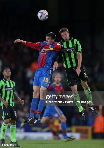 Crystal Palace's Owen Garvan and Brighton & Hove Albion's Matthew Upson battle for the ball