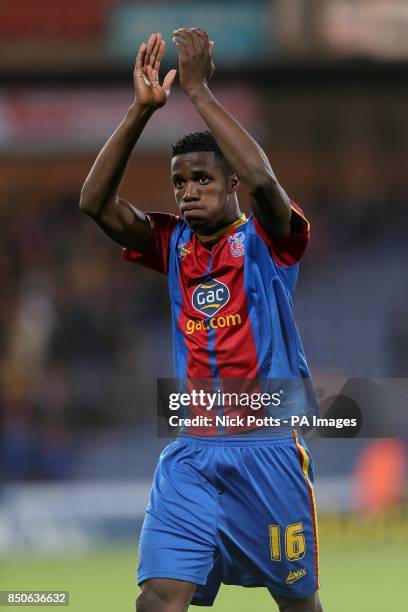 Crystal Palace's Wilfried Zaha acknowledges the fans after his final match at Selhurst Park as a Crystal Palace player