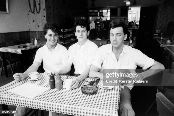 Photo of BLUE NILE; L-R keyboardist Paul Joseph Moore, vocalist Paul Buchanan, bass player Robert Bell