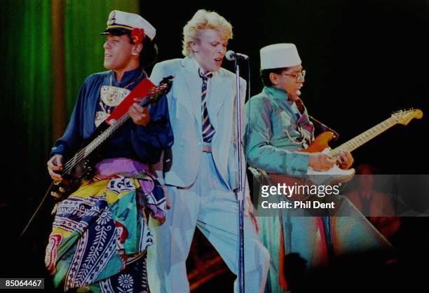 Photo of Carlos ALOMAR and Carmine ROJAS and David BOWIE, L-R: Carmine Rojas, David Bowie, Carlos Alomar performing live onstage on Serious Moonlight...