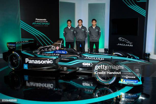 In this handout photo provided by Jaguar Racing, Nelson Piquet Jr, Mitch Evans and Ho-Pin Tung pose with the new Jaguar Racing I-TYPE 2 Formula E car...