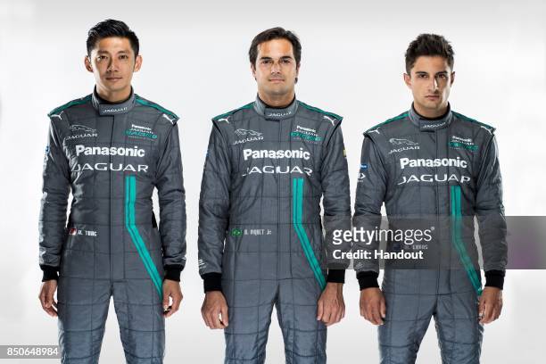 In this handout photo provided by Jaguar Racing, Drivers Ho-Pin Tung, Nelson Piquet Jr and Mitch Evans pose during the Panasonic Jaguar Racing...