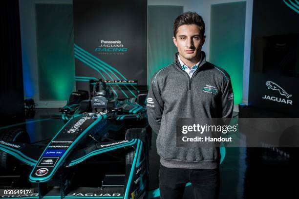 In this handout photo provided by Jaguar Racing, Driver Mitch Evans poses with the new Jaguar Racing I-TYPE 2 Formula E car during the Panasonic...