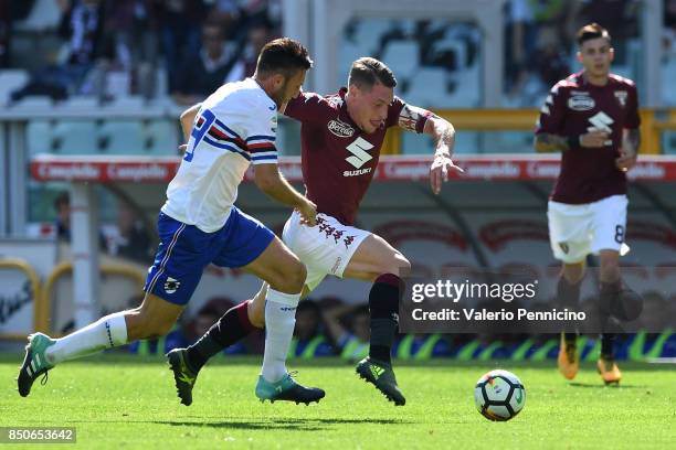 Andrea Belotti of Torino FC in action against Vasco Regini of UC Sampdoria during the Serie A match between Torino FC and UC Sampdoria at Stadio...