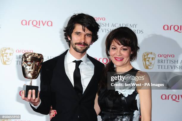 Presenter Helen McCrory and winner Ben Whishaw with the Best Leading Actor Award for Richard II, at the Arqiva British Academy Television Awards 2013...