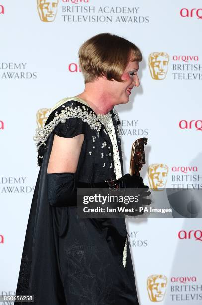 Grayson Perry in the press room at the Arqiva British Academy Television Awards 2013 at the Royal Festival Hall, London.