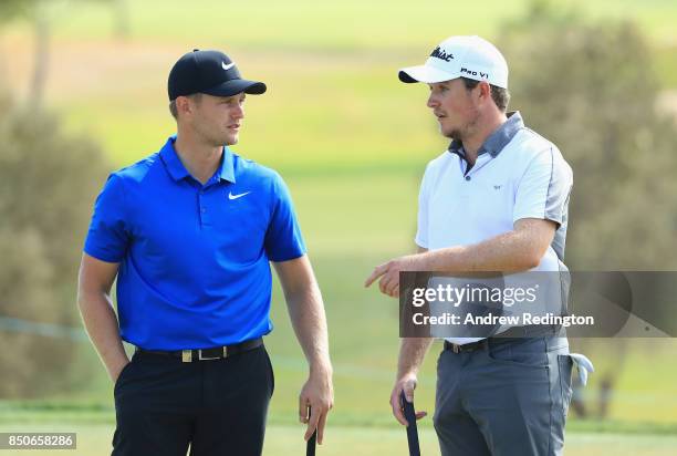 Tom Lewis and Eddie Pepperell of England on the 2nd green during day one of the 2017 Portugal Masters at Oceanico Victoria Golf Club on September 21,...