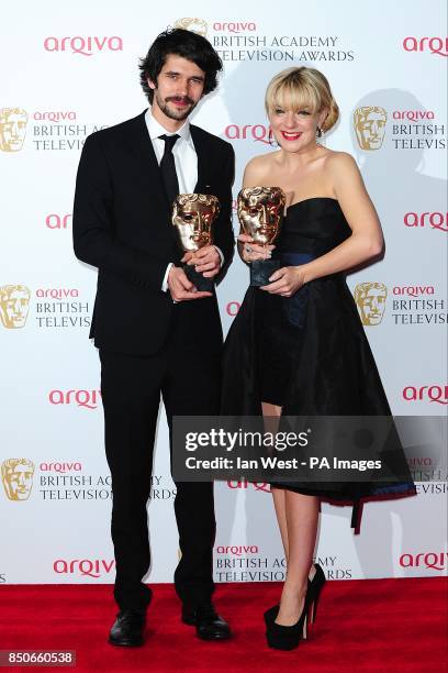 Ben Whishaw with the award for Best Leading Actor and Sheridan Smith the award for Best Leading Actress in the press room at the Arqiva British...