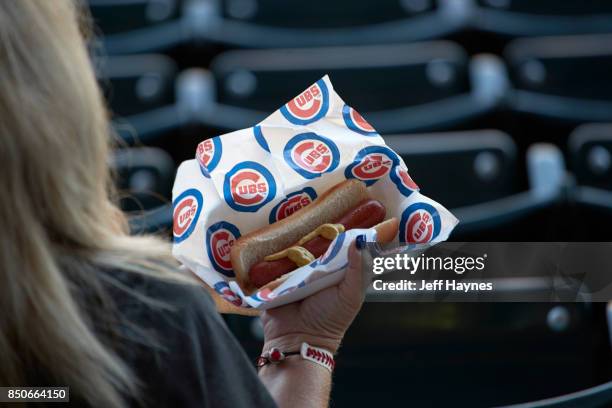 View of hot dog in wrapper with mustard before Chicago Cubs vs St. Louis Cardinals game at Wrigley Field. Chicago, IL 9/15/2017 CREDIT: Jeff Haynes