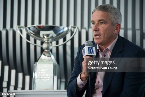 Commissioner Jay Monahan speaks with members of the media during a press conference prior to the start of the TOUR Championship, the final event of...