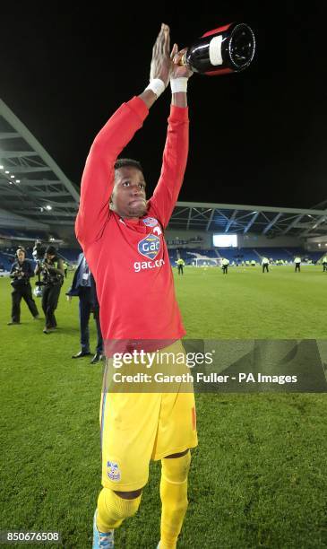 Crystal Palace's Wilfried Zaha celebrates after the final whistle