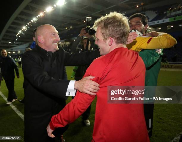 Crystal Palace's Jonathan Williams celebrates with his manager Ian Holloway after the final whistle